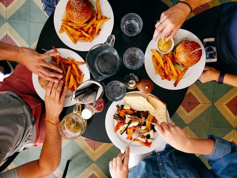 Share a meal with family at a local restaurant
